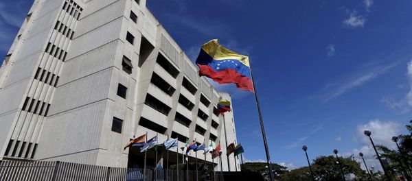 A man walks in front of a building of the Venezuela Supreme Court in Caracas December 23, 2015 A man walks in front of a building of the Venezuela Supreme Court in Caracas December 23, 2015 - Sputnik International
