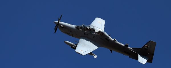 In this photograph taken on October 18, 2016, an Afghan Air Force Embraer A-29 Super Tucano aircraft flies during an airstrike training mission on the outskirts of Logar province - Sputnik International
