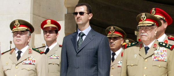 Syrian President Bashar al-Assad (C) new Defence Minister Hassan Turkmani (L) and former Defence Minister Mustafa Tlass attend a ceremony at the unknown soldier monument in Damascus, Syria October 6, 2003. Syrian President Bashar al-Assad (C) new Defence Minister Hassan Turkmani (L) and former Defence Minister Mustafa Tlass attend a ceremony at the unknown soldier monument in Damascus, Syria October 6, 2003. - Sputnik International