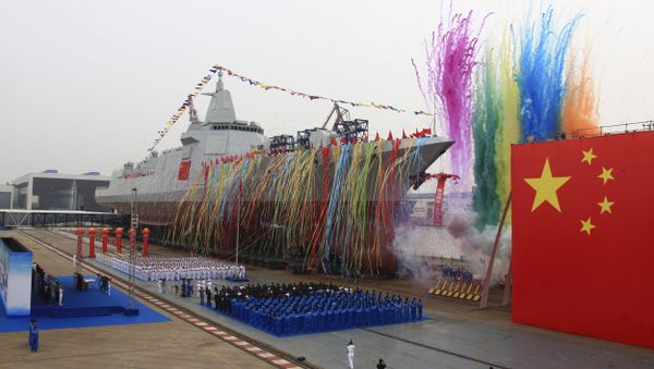 In this photo released by Xinhua News Agency, fireworks explode next to China's new domestically-built 10,000-ton Type 055 destroyer during a launching ceremony at Jiangnan Shipyard in Shanghai, China, Wednesday, June 28, 2017 In this photo released by Xinhua News Agency, fireworks explode next to China's new domestically-built 10,000-ton Type 055 destroyer during a launching ceremony at Jiangnan Shipyard in Shanghai, China, Wednesday, June 28, 2017 - Sputnik International