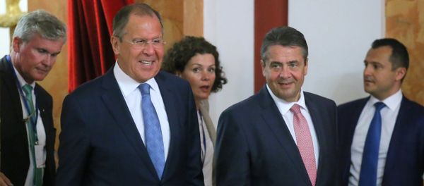 Foreground, from left: Russian Foreign Minister Sergei Lavrov and German Foreign Minister Sigmar Gabriel at the news conference in Krasnodar - Sputnik International