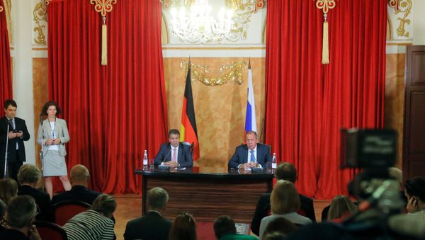 Russian Foreign Minister Sergei Lavrov and Foreign Minister of Germany Sigmar Gabriel, center, from right, at a news conference in Krasnodar Russian Foreign Minister Sergei Lavrov and Foreign Minister of Germany Sigmar Gabriel, center, from right, at a news conference in Krasnodar - Sputnik International