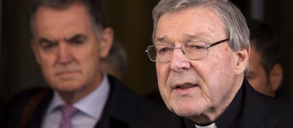 In this March 3, 2016 file photo, Australian cardinal George Pell reads a statement to reporters as he leaves the Quirinale hotel after meeting members of the Australian group of relatives and victims of priestly sex abuses, in Rome, Italy. In this March 3, 2016 file photo, Australian cardinal George Pell reads a statement to reporters as he leaves the Quirinale hotel after meeting members of the Australian group of relatives and victims of priestly sex abuses, in Rome, Italy. - Sputnik International