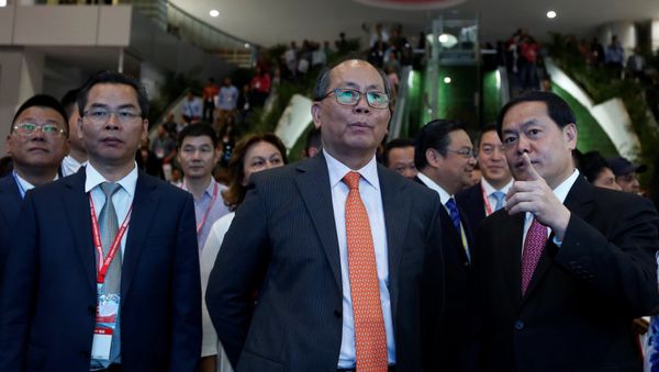 China's Ambassador to Mexico Qiu Xiaoqi listens to Mi Jiao Meng, Mayor of Huizhou City, during the Expo China Homelife Show, a platform for leading Chinese companies seeking to do business in Mexico, in Mexico City, Mexico June 13, 2017 - Sputnik International