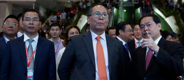 China's Ambassador to Mexico Qiu Xiaoqi listens to Mi Jiao Meng, Mayor of Huizhou City, during the Expo China Homelife Show, a platform for leading Chinese companies seeking to do business in Mexico, in Mexico City, Mexico June 13, 2017 China's Ambassador to Mexico Qiu Xiaoqi listens to Mi Jiao Meng, Mayor of Huizhou City, during the Expo China Homelife Show, a platform for leading Chinese companies seeking to do business in Mexico, in Mexico City, Mexico June 13, 2017 - Sputnik International