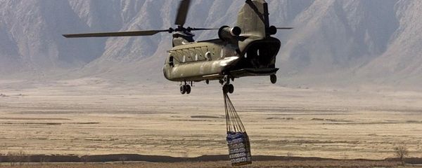 A U.S. Army CH-47 Chinook helicopter carries a cargo in Afghanistan (File) A U.S. Army CH-47 Chinook helicopter carries a cargo in Afghanistan (File) - Sputnik International