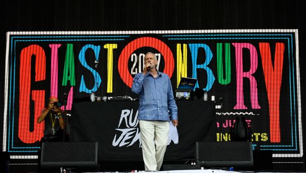 Britain's opposition Labour Party leader Jeremy Corbyn addresses revellers from the Pyramid Stage at Worthy Farm in Somerset during the Glastonbury Festival in Britain, June 24, 2017. Britain's opposition Labour Party leader Jeremy Corbyn addresses revellers from the Pyramid Stage at Worthy Farm in Somerset during the Glastonbury Festival in Britain, June 24, 2017. - Sputnik International