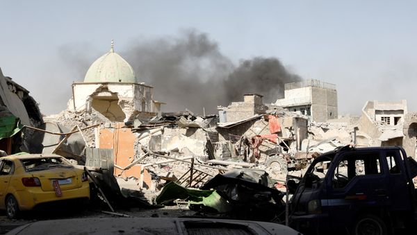 Smoke billows from the ruined Grand al-Nuri Mosque after it was retaken by the Iraqi forces at the Old City in Mosul, Iraq June 29, 2017 Smoke billows from the ruined Grand al-Nuri Mosque after it was retaken by the Iraqi forces at the Old City in Mosul, Iraq June 29, 2017 - Sputnik International