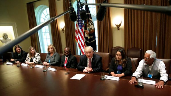 U.S. President Donald Trump (C) meets with immigration crime victims at the White House in Washington, U.S., June 28, 2017 U.S. President Donald Trump (C) meets with immigration crime victims at the White House in Washington, U.S., June 28, 2017 - Sputnik International