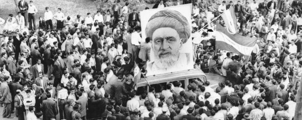 In this Dec. 13, 1951 file photo, crowds of supporters of Prime Minister Mossadegh gather around a huge portrait of Iranian Mullah Kashani, one of the powerful backers of Mossadegh's regime, in Tehran. Once expunged from its official history, documents outlining the U.S.-backed 1953 coup in Iran have been quietly published in June 2017, by the State Department, offering a new glimpse at an operation that ultimately pushed the country toward its 1979 Islamic Revolution and hostility with the West. - Sputnik International