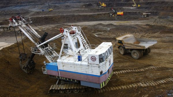Pit of the Titimukhta gold ore deposit, which is owned by Polyus, a subsidiary of Russia's biggest gold mining company Polyus Gold - Sputnik International