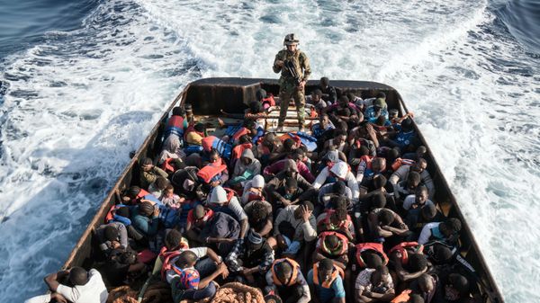 Migrants on a boat - Sputnik International