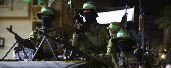 Masked militants from the Izzedine al-Qassam Brigades, a military wing of Hamas, ride vehicles during a rally marking Al-Quds, Jerusalem, Day in Nusseirat refugee camp, in the central Gaza Strip, Friday, June 23, 2017 Masked militants from the Izzedine al-Qassam Brigades, a military wing of Hamas, ride vehicles during a rally marking Al-Quds, Jerusalem, Day in Nusseirat refugee camp, in the central Gaza Strip, Friday, June 23, 2017 - Sputnik International
