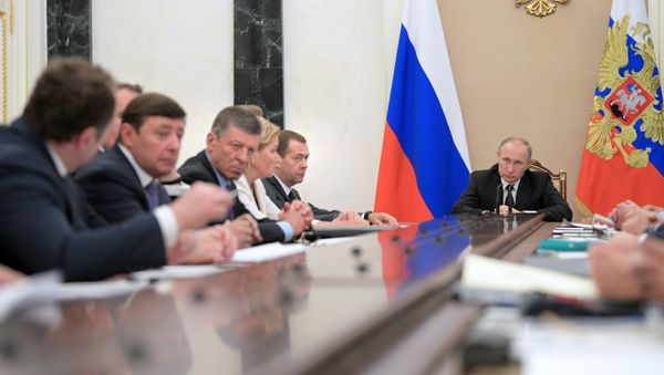President Vladimir Putin and Prime Minister Dmitry Medvedev at a Government meeting in Kremlin President Vladimir Putin and Prime Minister Dmitry Medvedev at a Government meeting in Kremlin - Sputnik International