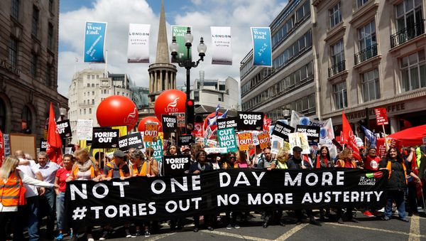 Demonstrators prepare to set off for Parliament Square on an anti-austerity rally and march organised by campaigners Peoples' Assembly, in central London, Britain July 1, 2017 Demonstrators prepare to set off for Parliament Square on an anti-austerity rally and march organised by campaigners Peoples' Assembly, in central London, Britain July 1, 2017 - Sputnik International