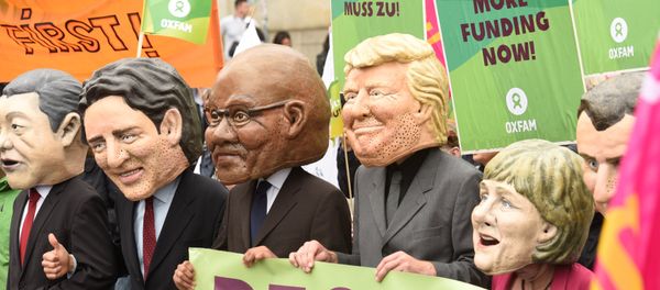 Oxfam’s Big Heads depict G20 leaders take part in protests ahead of the upcoming G20 summit in Hamburg, Germany July 2, 2017. Oxfam’s Big Heads depict G20 leaders take part in protests ahead of the upcoming G20 summit in Hamburg, Germany July 2, 2017. - Sputnik International