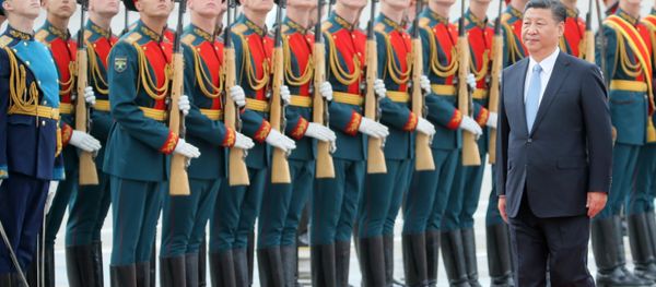 Chinese President Xi Jinping takes part in a welcoming ceremony upon his arrival at Moscow's Vnukovo airport Chinese President Xi Jinping takes part in a welcoming ceremony upon his arrival at Moscow's Vnukovo airport - Sputnik International