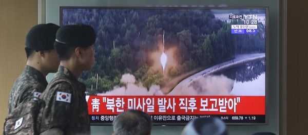 Army soldiers walk by a TV news program showing a file image of a missile being test-launched by North Korea at the Seoul Railway Station in Seoul, South Korea, Tuesday, July 4, 2017. Army soldiers walk by a TV news program showing a file image of a missile being test-launched by North Korea at the Seoul Railway Station in Seoul, South Korea, Tuesday, July 4, 2017. - Sputnik International