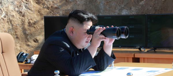 North Korean Leader Kim Jong Un looks on during the test-fire of inter-continental ballistic missile Hwasong-14 in this undated photo released by North Korea's Korean Central News Agency (KCNA) in Pyongyang, July, 4 2017. - Sputnik International
