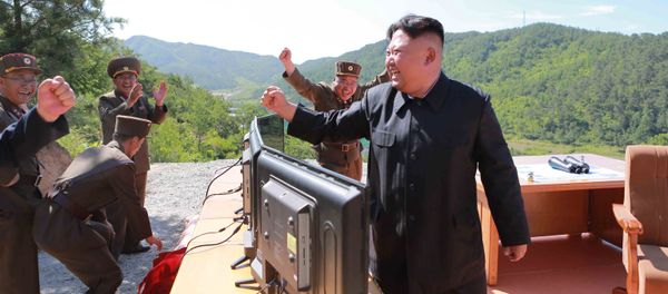 North Korean Leader Kim Jong Un reacts during the test-fire of intercontinental ballistic missile Hwasong-14 in this undated photo released by North Korea's Korean Central News Agency (KCNA) in Pyongyang, July, 4 2017. - Sputnik International