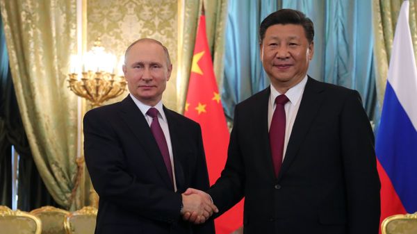 July 4, 2017. From left: Russian President Vladimir Putin meets with People's Republic of China President Xi Jinping in Moscow. - Sputnik International