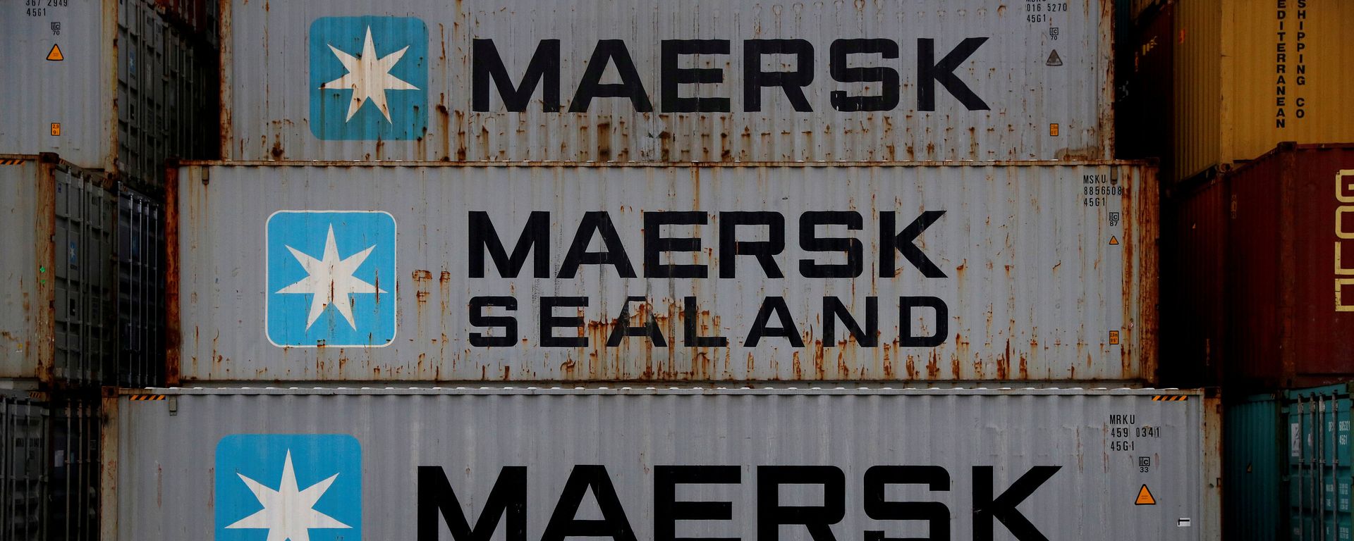 FILE PHOTO: Empty Maersk shipping containers are seen stacked at Peel Ports container terminal in Liverpool, Britain, December 9, 2016. FILE PHOTO: Empty Maersk shipping containers are seen stacked at Peel Ports container terminal in Liverpool, Britain, December 9, 2016. - Sputnik International, 1920, 05.11.2021