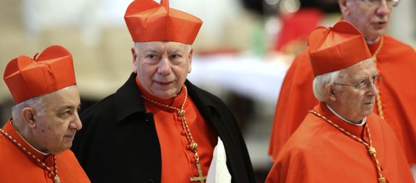 Italian Cardinal Francesco Coccopalmerio, second from left, attends a Mass for the election of a new pope celebrated by Cardinal Angelo Sodano, not pictured, inside St. Peter's Basilica, at the Vatican, Tuesday, March 12, 2013. - Sputnik International
