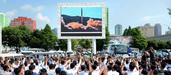 People watch a huge screen showing the test launch of intercontinental ballistic missile Hwasong-14 in this undated photo released by North Korea's Korean Central News Agency (KCNA), July 5, 2017 People watch a huge screen showing the test launch of intercontinental ballistic missile Hwasong-14 in this undated photo released by North Korea's Korean Central News Agency (KCNA), July 5, 2017 - Sputnik International