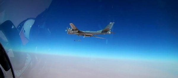 A Tu-95MS bomber launches a Kh-101 cruise missile at the ISIS facilities (Islamic State, an international terrorist organization banned in the Russian Federation) in Syria - Sputnik International