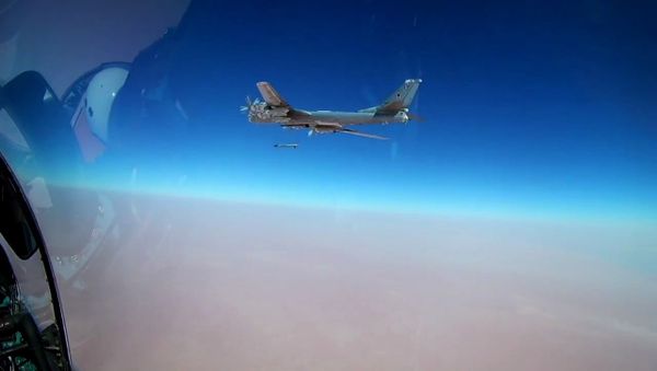 A Tu-95MS bomber launches a Kh-101 cruise missile at the ISIS facilities (Islamic State, an international terrorist organization banned in the Russian Federation) in Syria - Sputnik International