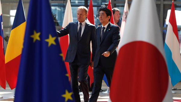 Japan's Prime Minister Shinzo Abe (R) is welcomed by European Council President Donald Tusk at the start of a European Union-Japan summit in Brussels, Belgium July 6, 2017 Japan's Prime Minister Shinzo Abe (R) is welcomed by European Council President Donald Tusk at the start of a European Union-Japan summit in Brussels, Belgium July 6, 2017 - Sputnik International