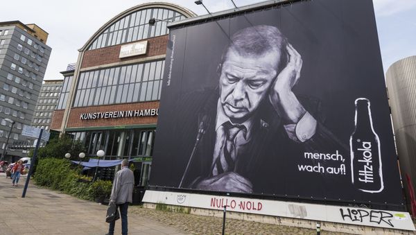 An advertising board of the beverage producer Fritz Kola depicting Turkish president Recep Tayyip Erdogan can be seen in Hamburg, Germany, Thursday, June 29. 2017 An advertising board of the beverage producer Fritz Kola depicting Turkish president Recep Tayyip Erdogan can be seen in Hamburg, Germany, Thursday, June 29. 2017 - Sputnik International