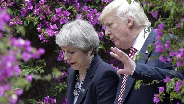 US President Donald Trump, right, talks with British Prime Minister Theresa May in Taormina, Italy, Friday, May 26, 2017. US President Donald Trump, right, talks with British Prime Minister Theresa May in Taormina, Italy, Friday, May 26, 2017. - Sputnik International