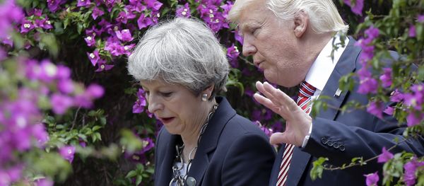 US President Donald Trump, right, talks with British Prime Minister Theresa May in Taormina, Italy, Friday, May 26, 2017. - Sputnik International