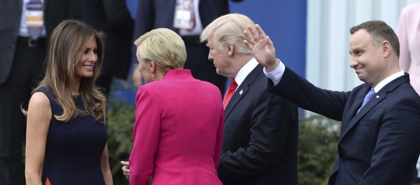 U.S. President Donald Trump and U.S. First Lady Melania Trump speak to Poland's first lady Agata Kornhauser-Duda as Poland's President Andrzej Duda waves, in Krasinski Square, in Warsaw, Poland, Thursday, July 6, 2017. U.S. President Donald Trump and U.S. First Lady Melania Trump speak to Poland's first lady Agata Kornhauser-Duda as Poland's President Andrzej Duda waves, in Krasinski Square, in Warsaw, Poland, Thursday, July 6, 2017. - Sputnik International