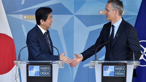 Japanese PM Abe and NATO Secretary General Stoltenberg meet at NATO headquarters in Brussels. Japanese PM Abe and NATO Secretary General Stoltenberg meet at NATO headquarters in Brussels. - Sputnik International