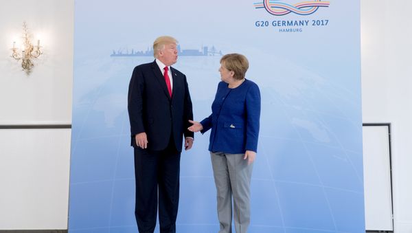 German Chancellor Angela Merkel meets U.S. President Donald Trump on the eve of the G-20 summit in Hamburg, Germany, July 6, 2017 - Sputnik International