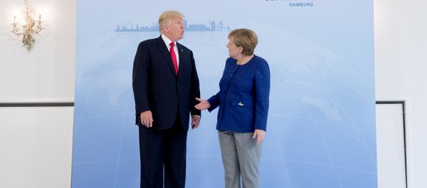German Chancellor Angela Merkel meets U.S. President Donald Trump on the eve of the G-20 summit in Hamburg, Germany, July 6, 2017 - Sputnik International
