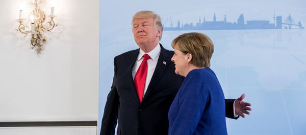 German Chancellor Angela Merkel meets U.S. President Donald Trump on the eve of the G-20 summit in Hamburg, Germany, July 6, 2017 German Chancellor Angela Merkel meets U.S. President Donald Trump on the eve of the G-20 summit in Hamburg, Germany, July 6, 2017 - Sputnik International
