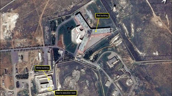 A handout satellite image released by The French national Space study centre (CNES) and the ASTRIUM, the aerospace maufacture subsiduary of the European Aeronautic Defence and Space Company (EADS) and received from Amnesty International on February 7, 2017 by shows the military-run Saydnaya prison, one of Syria's largest detention centres located 30 kilometres (18 miles) north of Damascus. A handout satellite image released by The French national Space study centre (CNES) and the ASTRIUM, the aerospace maufacture subsiduary of the European Aeronautic Defence and Space Company (EADS) and received from Amnesty International on February 7, 2017 by shows the military-run Saydnaya prison, one of Syria's largest detention centres located 30 kilometres (18 miles) north of Damascus. - Sputnik International