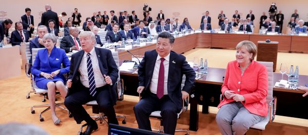 (L-R) US President Donald Trump, China's President Xi Jinping, German Chancellor Angela Merkel, Argentinia's President Mauricio Macri and Australia's Prime Minister Malcolm Turnbull turn around for photographers at the start of the first working sessionthe G20 summit in Hamburg, Germany, July 7, 2017 (L-R) US President Donald Trump, China's President Xi Jinping, German Chancellor Angela Merkel, Argentinia's President Mauricio Macri and Australia's Prime Minister Malcolm Turnbull turn around for photographers at the start of the first working sessionthe G20 summit in Hamburg, Germany, July 7, 2017 - Sputnik International