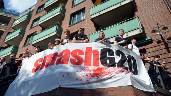 Participants in the protest rally ahead of the G20 Summit In Hamburg - Sputnik International