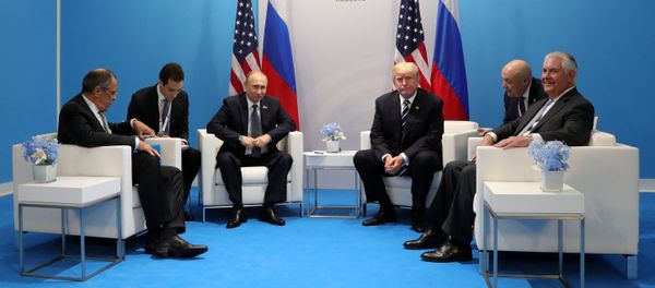 Russian President Vladimir Putin and President of the USA Donald Trump, third right, during their meeting on the sidelines of the G20 summit in Hamburg. Right: US Secretary if State Rex Tillerson; left: Russian Foreign Minister Sergei Lavrov. Russian President Vladimir Putin and President of the USA Donald Trump, third right, during their meeting on the sidelines of the G20 summit in Hamburg. Right: US Secretary if State Rex Tillerson; left: Russian Foreign Minister Sergei Lavrov. - Sputnik International