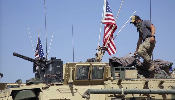 This Saturday, April. 29, 2017 still taken from video, shows an American soldier standing on an armored vehicle in the northern village of Darbasiyah, Syria This Saturday, April. 29, 2017 still taken from video, shows an American soldier standing on an armored vehicle in the northern village of Darbasiyah, Syria - Sputnik International