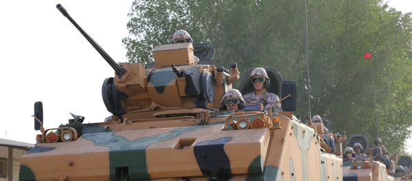 Turkish APC drives at their military base in Doha, Qatar June 18, 2017. Picture taken June 18, 2017 - Sputnik International
