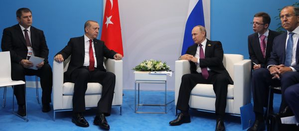July 8, 2017. Russian President Vladimir Putin and President of Turkey Recep Tayyip Erdogan, second left, talk during their meeting on the sidelines of the G20 summit in Hamburg. Right: Russian Foreign Minister Sergei Lavrov July 8, 2017. Russian President Vladimir Putin and President of Turkey Recep Tayyip Erdogan, second left, talk during their meeting on the sidelines of the G20 summit in Hamburg. Right: Russian Foreign Minister Sergei Lavrov - Sputnik International
