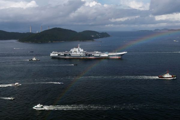 China's aircraft carrier Liaoning sails past a rainbow as it enters Hong Kong, China, July 7, 2017 - Sputnik International