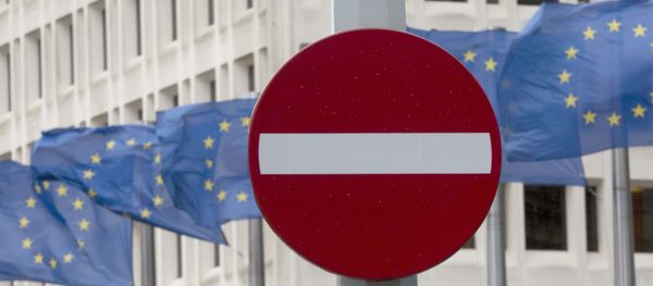 EU flags flap in the wind behind a no entry traffic sign in front of EU headquarters in Brussels. EU flags flap in the wind behind a no entry traffic sign in front of EU headquarters in Brussels. - Sputnik International