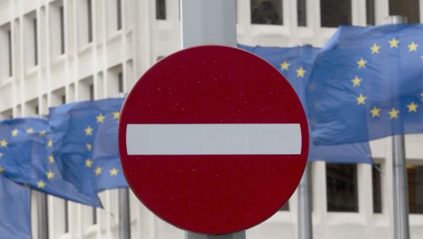 EU flags flap in the wind behind a no entry traffic sign in front of EU headquarters in Brussels. EU flags flap in the wind behind a no entry traffic sign in front of EU headquarters in Brussels. - Sputnik International