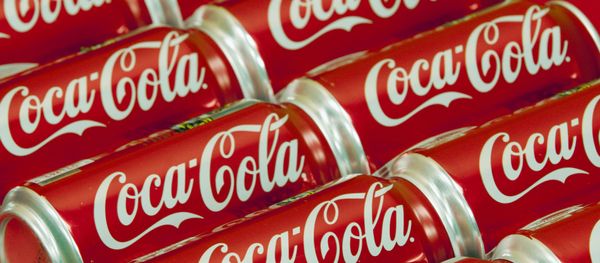 FILE - This July 15, 2013 file photo shows cans of Coca-Cola in Doral, Fla. - Sputnik International